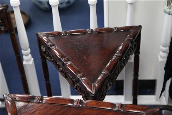 An unusual Chinese rosewood triangular shaped nest of quartetto tables, W.2ft